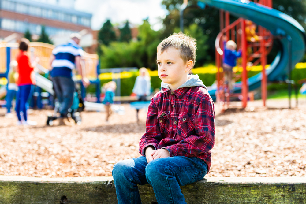 A,handsome,boy,with,adhd,,autism,,asperger,syndrome,sitting,at